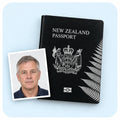 A New Zealand passport with a printed passport photo