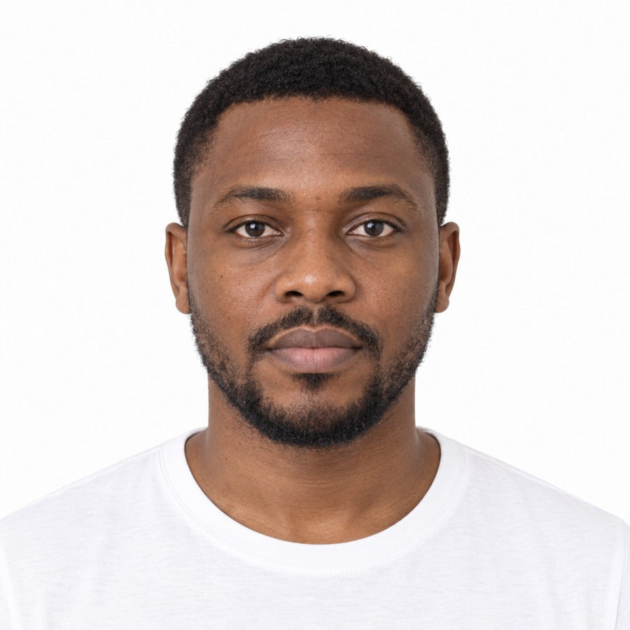 A finished US visa photo of a man on a plain white background, with its measurements marked